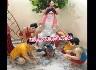 Baba Statue With Playing Children Baba Statue With Playing Children