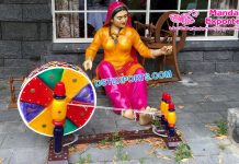 Punjabi Lady Fiber Statue With Charkha Punjabi Lady Fiber Statue With Charkha