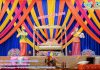 Traditional Mehndi Stage with Colorful Backdrops Traditional Mehndi Stage with Colorful Backdrops