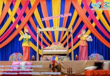 Traditional Mehndi Stage with Colorful Backdrops Traditional Mehndi Stage with Colorful Backdrops