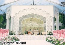 Contemporary White Theme Laser Cut Wedding Mandap Wedding, mandap, Wedding mandap, laser cut mandap, metal laser cut mandap, Indian wedding mandap, mandap for sale, trending wedding mandap, Bollywood mandap, Jodha Akbar wedding mandap, double pole wedding mandap, triple wedding mandap, mandap prices, Jali carved mandap, affordable wedding mandap, Asian wedding mandap, trending elephant mandap, butterfly wedding mandap, Delizio wedding mandap, royal wedding mandap, golden carved wedding mandap, outdoor wedding mandap, indoor wedding mandap, crystal wedding mandap, mustaches wedding mandap, maharani wedding mandap, anmol wedding mandap, floral mandap, maharaja style wedding mandap,