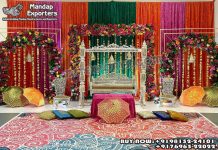 Colorful Theme Henna Night Stage Decor Props & Ideas we are manufacturer and exporters of all types of wedding product like - wedding mandap , crystal mandaps ,metal mandaps, wooden mandaps , stages , wedding frames/panels, wedding sofa set, bride groom chairs, mandap chairs ,punjabi culture statues , wedding swings , horse drawn carriages ,backdrop curtain etc.