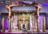 Ravishing Wooden Mandap for Gujarati Weddings Fiber Mandaps, Wooden Mandaps, Crystal Mandaps, Metal Mandaps, Mandap stage, Indian Mandaps, Modern mandaps, open mandap, Wooden Look Mandap, FRP Mandaps, Antique Mandaps, Brown Mandap, Wooden look fiber mandap