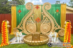 Grand Paisley Haldi Backdrop Panels,Luxury Haldi Ceremony Stage Décor ,Indian Wedding Haldi Stage Setup,Golden Paisley Backdrop for Wedding,Traditional Haldi Ceremony Decoration Ideas, Mehndi Stage Backdrop Panels,Haldi Mehndi Wedding Decoration Manufacturer ,Luxury Wedding Stage Paisley Panels ,Indian Pre-Wedding Stage Backdrop Ideas ,Gold Paisley Frame for Haldi Function ,Royal Wedding Haldi Decor Set ,Mandap Exporters Haldi Stage Design ,Indian Wedding Decorative Backdrop Panels ,Haldi Ceremony Golden Backdrop Frames ,Wedding Elephant Statue Décor ,Marigold Garland Wedding Decoration ,Grand Paisley Style Wedding Stage Setup