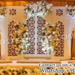 wooden wedding backdrop panels, carved wooden backdrop, wedding stage decoration panels, wooden arch panels, Muslim wedding backdrop, Walima stage decoration, Indian wedding backdrop supplier, luxury wedding stage panels, handcrafted wooden backdrops, wedding reception stage décor, cultural event backdrop, wooden event décor panels, DST Exports backdrop panels, traditional wedding stage design, wedding backdrop exporter.
