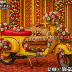 Vibrant Haldi Mehndi Colorful Entry Scooter Prop For Traditional Indian Bride Entry with colorful motifs and elegant bridal seating