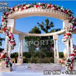 Bollywood Wedding Mandap USA, Outdoor Indian Wedding Stage, Destination Wedding Mandap, Luxury Fiber Mandap, Indian Mandap for Resort Wedding, Grand Indian Wedding Decor, Outdoor Mandap Setup, Bollywood Style Mandap, White Carved Mandap for Wedding, Indian Wedding Stage Exporter, Mandap Exporters USA, Royal Wedding Mandap, Elegant Fiber Wedding Mandap, Destination Wedding Decoration