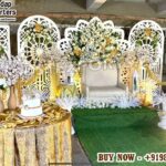 Luxury wedding backdrop panels, laser cut wedding stage, elegant wedding stage setup, white floral backdrop design, MDF laser cut panels, wedding decoration panels USA, event stage décor, modern wedding gate backdrop, ivory laser cut backdrop, wedding stage manufacturer India, customized wedding stage backdrop, luxury wedding décor exporter, DST Home Furniture, Mandap Exporters, wedding event decoration suppliers.