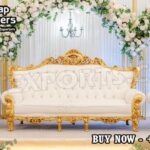 Royal wedding sofa set, King and queen throne chairs ,Luxury event sofa set, Golden wedding stage seating, Antique gold carved sofa ,Bridal stage sofa set ,Premium wedding furniture, Wedding stage throne sofa, Victorian style wedding sofa ,Handmade carved wedding seating ,Mandap Exporters wedding sofa ,White and gold wedding couch