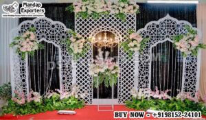 Arabic wedding backdrop, white wedding backdrop panels, Islamic wedding stage decor, Nikah stage backdrop, Walima wedding backdrop, modern wedding backdrop panels, Arabic arch wedding decor, Muslim wedding stage setup, laser cut wedding panels, lattice wedding backdrop, wedding backdrop exporters India, wedding decor panels USA, luxury wedding stage design, reusable wedding backdrop, DST International wedding decor, DST Home Furniture backdrop, Arabic style event backdrop, wedding stage panels for rent