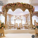 Bollywood Wedding Mandap USA, Outdoor Indian Wedding Stage, Destination Wedding Mandap, Luxury Fiber Mandap, Indian Mandap for Resort Wedding, Grand Indian Wedding Decor, Outdoor Mandap Setup, Bollywood Style Mandap, White Carved Mandap for Wedding, Indian Wedding Stage Exporter, Mandap Exporters USA, Royal Wedding Mandap, Elegant Fiber Wedding Mandap, Destination Wedding Decoration