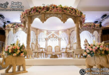 New Wooden Wedding Mandap with Elephant Base Pillars Bollywood Wedding Mandap USA, Outdoor Indian Wedding Stage, Destination Wedding Mandap, Luxury Fiber Mandap, Indian Mandap for Resort Wedding, Grand Indian Wedding Decor, Outdoor Mandap Setup, Bollywood Style Mandap, White Carved Mandap for Wedding, Indian Wedding Stage Exporter, Mandap Exporters USA, Royal Wedding Mandap, Elegant Fiber Wedding Mandap, Destination Wedding Decoration