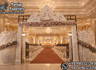 Elegant Laser Cut Wedding Entrance Gate with Designer Panels Bollywood Wedding Mandap USA, Outdoor Indian Wedding Stage, Destination Wedding Mandap, Luxury Fiber Mandap, Indian Mandap for Resort Wedding, Grand Indian Wedding Decor, Outdoor Mandap Setup, Bollywood Style Mandap, White Carved Mandap for Wedding, Indian Wedding Stage Exporter, Mandap Exporters USA, Royal Wedding Mandap, Elegant Fiber Wedding Mandap, Destination Wedding Decoration