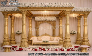 Royal Wedding Mandap Set ,Maharaja Style Mandap ,Luxury Indian Wedding Mandap, Gold Carved Wedding Mandap, South Indian Traditional Mandap, Premium Wedding Stage Decoration, Premium Wedding Stage Decoration , Antique Gold Mandap Design , Designer Mandap for Wedding, Wedding Mandap Manufacturers India, Carved Wooden Mandap Exporters, Destination Wedding Mandap Setup, Indian Wedding Stage Furniture, Luxury Bridal Stage Setup, Grand Wedding Mandap Decoration, Ornate Pillar Mandap Design, Wedding Sofa Set with Mandap, High-End Wedding Decor India, Traditional Hindu Wedding Mandap, Hand Carved Teak Wood Mandap, Mandap Export Quality Furniture