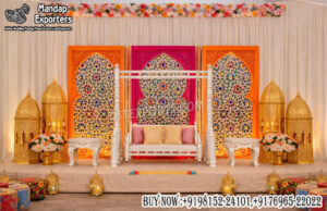 mehndi stage decoration, Arabian theme wedding stage, colorful mehndi backdrop, laser cut panels mehndi stage, Moroccan wedding decor setup, jhula mehndi stage setup, haldi ceremony stage decoration, sangeet stage backdrop design, vibrant wedding stage decor, designer mehndi backdrop panels, wedding stage with lanterns, luxury mehndi setup India, event decor exporters India, decorative wedding panels supplier, engagement stage colorful backdrop, wedding swing stage setup, festive wedding decor ideas, banquet hall mehndi stage setup