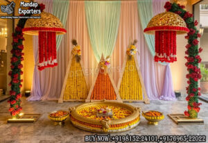 haldi stage decoration, marigold haldi backdrop, haldi ceremony setup India, haldi decor with urli, traditional haldi stage design, floral haldi backdrop ideas, mehndi haldi stage decor, marigold wedding decoration setup, haldi stage with flowers, urli decoration for haldi, Indian wedding haldi decor, colorful haldi backdrop design, haldi stage with umbrella decor, festive wedding stage setup, daytime wedding decoration ideas, haldi decor supplier India, wedding decor exporters India, floral backdrop haldi ceremony