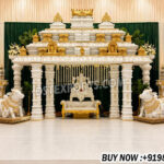 south indian wedding mandap, temple style wedding mandap, manavarai mandap design, hindu wedding mandap decoration, white gold wedding mandap, traditional wedding mandap India, luxury wedding mandap setup, carved mandap pillars, muhurtham stage decoration, wedding mandap exporters India, premium mandap design, temple theme wedding decor, indian wedding stage mandap, decorative mandap supplier