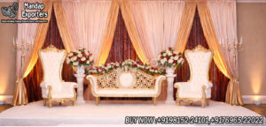 walima stage decoration, muslim wedding stage setup, walima reception stage decor, wedding throne chairs sofa set, royal wedding sofa set, luxury wedding stage backdrop, bridal stage sofa set, gold wedding throne chairs, reception stage decoration ideas, muslim wedding decor stage, elegant wedding stage setup, banquet hall wedding stage decor, designer wedding furniture India, wedding sofa set supplier, event decor exporters India, royal wedding stage furniture, engagement stage sofa set, premium wedding stage design