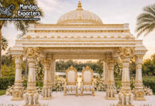 Splendid Dome Style Wedding Mandap With Elephant Pillars white gold wedding mandap, roman style wedding mandap, luxury wedding mandap design, carved wedding mandap India, premium wedding mandap setup, decorative mandap panels, wedding mandap with pillars, designer wedding mandap for sale, wedding mandap manufacturers India, mandap exporters India, luxury wedding stage mandap, elegant wedding mandap design, banquet hall mandap setup, destination wedding mandap decor, classic wedding mandap India