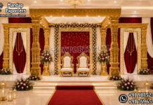 Classic South Indian Wedding Ganesha Pillar Mandap south indian wedding mandap, temple style wedding mandap, manavarai mandap design, hindu wedding mandap decoration, white gold wedding mandap, traditional wedding mandap India, luxury wedding mandap setup, carved mandap pillars, muhurtham stage decoration, wedding mandap exporters India, premium mandap design, temple theme wedding decor, indian wedding stage mandap, decorative mandap supplier