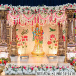 South Indian wedding mandap, classical manavarai setup, traditional wedding mandap, temple style mandap, South Indian stage decor, carved wedding mandap, floral manavarai decor, Indian wedding stage setup, wedding mandap manufacturers, decorative wedding pillars, luxury mandap setup, cultural wedding decor, antique wedding mandap, mandap exporters, traditional Hindu wedding decor