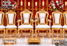 Deluxe Indian Marriage Mandap Golden Chairs Golden vedi chair set, Hindu wedding chair setup, wedding vedi décor, floral wedding backdrop, traditional wedding seating, Sankheda wedding furniture, luxury wedding vedi, Indian wedding mandap chairs, ceremonial wedding chair set, wedding stage seating, floral arch wedding décor, peacock wedding backdrop, premium wedding furniture, royal wedding setup, Hindu marriage décor, wedding ritual seating, decorative vedi chairs, luxury mandap seating, engagement stage décor, banquet wedding setup Luxury Maharaja & Maharani Mandap Chair Collection Traditional Bollywood Style Golden Mandap Chair Set