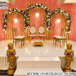 golden arch wedding backdrop, metal arch mandap, wedding stage arch decor, floral arch wedding stage, layered arch backdrop, wedding mandap frame design, engagement stage backdrop, modern wedding arch decor, luxury wedding stage setup, floral metal arches, wedding stage decoration panels, romantic wedding backdrop, event arch decor, mandap exporters backdrop, premium wedding stage design