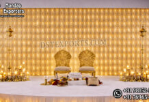 Imperial Candle Lit Panels For Reception Stage Decor reception stage decor, laser cut metal backdrop, floral wedding stage, candle wall backdrop, luxury reception stage, wedding stage decoration, elegant wedding backdrop, floral wall decor, wedding sofa stage setup, metal panel backdrop, crystal hanging backdrop, royal wedding stage, luxury event decor, wedding stage furniture, mandap exporters decor