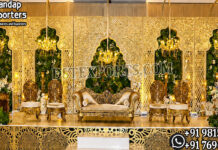 Indian Wedding Mirror Work Backdrop Panel for Reception Moroccan style backdrop, lotus carved backdrop, mirror wedding backdrop, yellow haldi décor, mehendi ceremony setup, luxury wedding backdrop, floral haldi stage, decorative event backdrop, carved wedding panels, Moroccan wedding décor, wedding lounge setup, traditional haldi decoration, event décor manufacturers, wedding backdrop exporters
