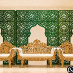 reception stage decor, laser cut metal backdrop, floral wedding stage, candle wall backdrop, luxury reception stage, wedding stage decoration, elegant wedding backdrop, floral wall decor, wedding sofa stage setup, metal panel backdrop, crystal hanging backdrop, royal wedding stage, luxury event decor, wedding stage furniture, mandap exporters decor