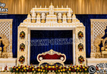 Majestic Malayalam Wedding Kanyadanam Stage south indian wedding mandap, temple style wedding mandap, manavarai mandap design, hindu wedding mandap decoration, white gold wedding mandap, traditional wedding mandap India, luxury wedding mandap setup, carved mandap pillars, muhurtham stage decoration, wedding mandap exporters India, premium mandap design, temple theme wedding decor, indian wedding stage mandap, decorative mandap supplier