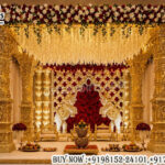 Royal wedding mandap, elephant theme mandap, Indian wedding mandap, luxury mandap setup, golden wedding mandap, carved wedding mandap, palace style mandap, traditional wedding stage, floral wedding mandap, luxury wedding décor, elephant statue mandap, grand wedding stage, royal Indian wedding décor, premium mandap manufacturers, wedding mandap exporters