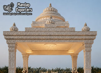 Traditional Temple Style Mandap with Lotus Carved Dome south indian wedding mandap, temple style wedding mandap, manavarai mandap design, hindu wedding mandap decoration, white gold wedding mandap, traditional wedding mandap India, luxury wedding mandap setup, carved mandap pillars, muhurtham stage decoration, wedding mandap exporters India, premium mandap design, temple theme wedding decor, indian wedding stage mandap, decorative mandap supplier