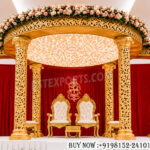 Tamil wedding mandapam, round kalyana mandapam, luxury wedding mandap, South Indian wedding décor, golden wedding mandap, circular wedding canopy, traditional Tamil mandap, designer wedding mandapam, carved mandap pillars, premium wedding stage décor, Hindu wedding mandap, royal wedding setup, luxury marriage mandap, banquet hall wedding mandap, decorative wedding canopy, floral wedding mandap, destination wedding décor, ceremonial wedding stage, handcrafted mandap design, elegant wedding mandapam, Indian wedding stage setup, luxury mandap pillars, wedding ceremony décor, cultural wedding mandap, premium wedding furniture