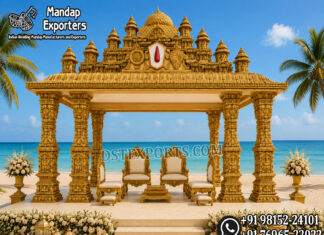 Grand Gopuram Temple Style Mandap For Destination Weddings South Indian temple mandap, luxury wedding mandap decor, temple style wedding stage, traditional wedding mandap, grand wedding backdrop, white and gold mandap, carved wedding stage, premium wedding decor, Indian wedding stage setup, royal wedding mandap, handcrafted mandap design, South Indian wedding decor, designer wedding stage, ornate temple backdrop, luxury wedding furniture, wedding event decor manufacturer, carved pillar mandap, wedding reception stage, Hindu wedding mandap setup