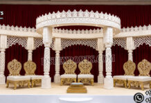 Grand Royal Rajwada Theme Wedding Mandap Setup destination wedding mandap, fusion wedding pavilion mandap, luxury wedding canopy, outdoor wedding mandap, white and gold wedding mandap, laser cut wedding mandap, Islamic style wedding mandap, Mughal inspired mandap, royal wedding pavilion, designer wedding mandap setup, premium wedding mandap décor, floral wedding mandap, crystal hanging mandap, luxury phera mandap, wedding stage decoration, modern wedding mandap design, elegant wedding canopy setup, destination wedding decor Royal Mughal Wedding Stage Backdrop, Mughal Arch Wedding Backdrop, Fiber Wedding Stage Panels, Luxury Wedding Stage Decor, Arabic Wedding Backdrop, Muslim Wedding Stage Setup, Nikkah Stage Decoration, Walima Stage Backdrop, Reception Stage Design, Wedding Backdrop Manufacturer, FRP Wedding Panels, Carved Wedding Backdrop, Indian Wedding Stage Decor, Heritage Wedding Backdrop, Dome Arch Backdrop Panels, Event Stage Decoration, Wedding Furniture Set, Royal Wedding Sofa Set, Bride Groom Stage Setup