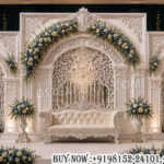 Reception Backdrop Panels, American Style Wedding Stage, White Reception Stage Decor, Luxury Wedding Backdrop, Royal Reception Setup, Wedding Stage Decoration, Elegant Wedding Backdrop, Reception Night Stage Decor, Premium Wedding Panels, Floral Reception Backdrop, Designer Wedding Stage, Wedding Sofa Stage Setup, Luxury Event Decor, White Theme Wedding Decor, Grand Reception Stage, Wedding Back Wall Panels