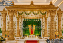 Grandeur Tirupati Balaji Mandap for Traditional Hindu Marriages South Indian temple mandap, luxury wedding mandap decor, temple style wedding stage, traditional wedding mandap, grand wedding backdrop, white and gold mandap, carved wedding stage, premium wedding decor, Indian wedding stage setup, royal wedding mandap, handcrafted mandap design, South Indian wedding decor, designer wedding stage, ornate temple backdrop, luxury wedding furniture, wedding event decor manufacturer, carved pillar mandap, wedding reception stage, Hindu wedding mandap setup