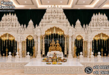 Luxury Manavarai Theme Tamilian Wedding Mandap destination wedding mandap, fusion wedding pavilion mandap, luxury wedding canopy, outdoor wedding mandap, white and gold wedding mandap, laser cut wedding mandap, Islamic style wedding mandap, Mughal inspired mandap, royal wedding pavilion, designer wedding mandap setup, premium wedding mandap décor, floral wedding mandap, crystal hanging mandap, luxury phera mandap, wedding stage decoration, modern wedding mandap design, elegant wedding canopy setup, destination wedding decor Royal Mughal Wedding Stage Backdrop, Mughal Arch Wedding Backdrop, Fiber Wedding Stage Panels, Luxury Wedding Stage Decor, Arabic Wedding Backdrop, Muslim Wedding Stage Setup, Nikkah Stage Decoration, Walima Stage Backdrop, Reception Stage Design, Wedding Backdrop Manufacturer, FRP Wedding Panels, Carved Wedding Backdrop, Indian Wedding Stage Decor, Heritage Wedding Backdrop, Dome Arch Backdrop Panels, Event Stage Decoration, Wedding Furniture Set, Royal Wedding Sofa Set, Bride Groom Stage Setup
