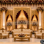 Royal wedding stage, Indian wedding reception stage, luxury wedding mandap, palace style wedding stage, South Indian wedding stage, carved wedding backdrop, royal mandap design, elephant wedding stage, grand wedding stage decoration, traditional Indian wedding setup, designer mandap stage, wedding stage for reception, luxury wedding décor, white carved mandap, Maharaja style wedding stage, premium wedding backdrop, handcrafted wedding mandap, floral wedding stage, wedding event stage, decorative mandap setup