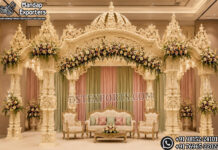 Majestic Peacock Theme Dual Pole Mandap with Dome South Indian temple mandap, luxury wedding mandap decor, temple style wedding stage, traditional wedding mandap, grand wedding backdrop, white and gold mandap, carved wedding stage, premium wedding decor, Indian wedding stage setup, royal wedding mandap, handcrafted mandap design, South Indian wedding decor, designer wedding stage, ornate temple backdrop, luxury wedding furniture, wedding event decor manufacturer, carved pillar mandap, wedding reception stage, Hindu wedding mandap setup