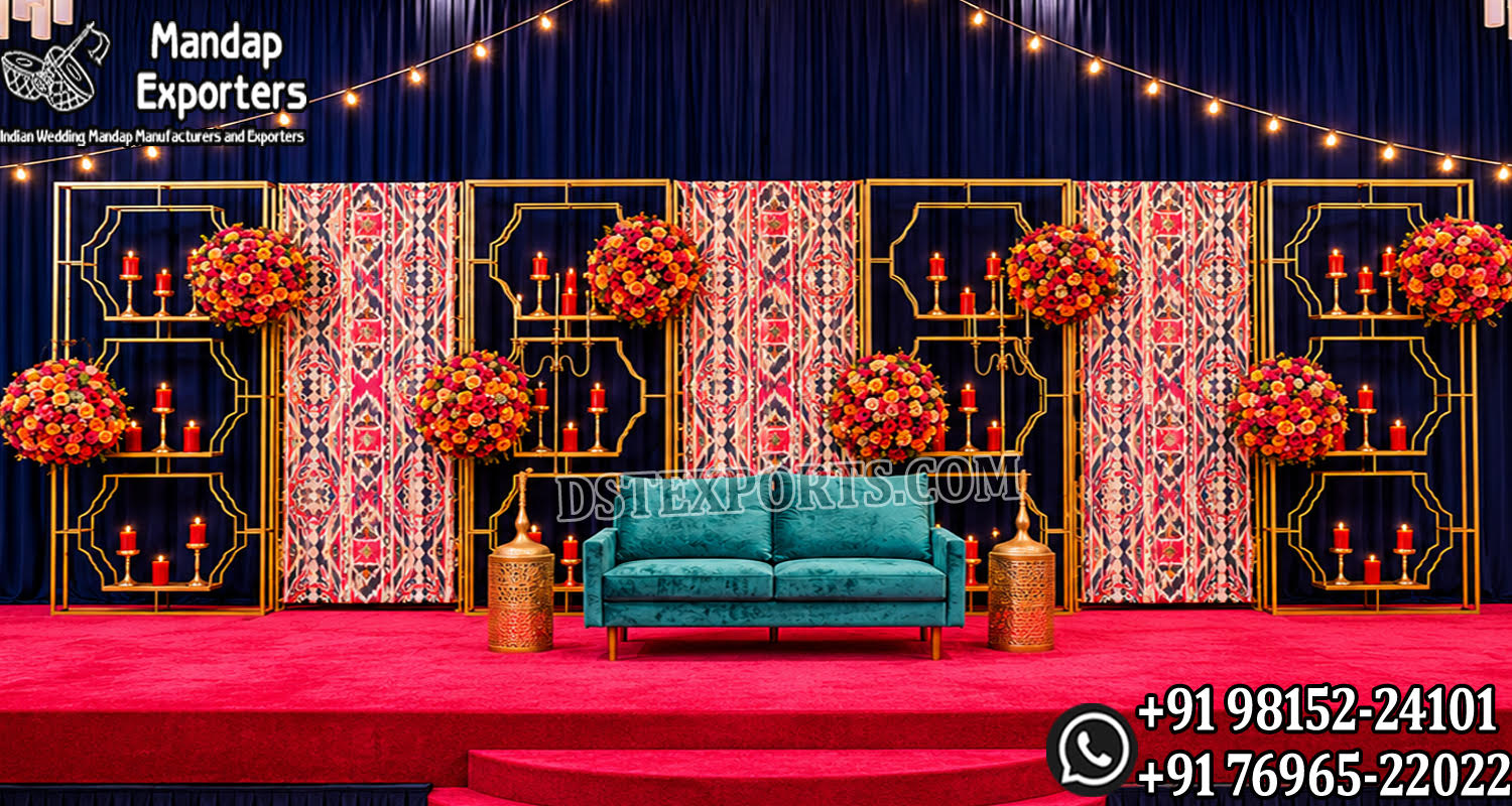 candle lit wedding stage, green gold wedding backdrop, candle wall wedding decor, luxury wedding stage backdrop, engagement stage green gold theme, wedding stage with candles, elegant wedding backdrop panels, floral frame wedding stage, modern wedding stage decor, reception stage backdrop design, candle light wedding decoration, designer wedding stage India, banquet hall wedding decor, wedding decor exporters India, premium event backdrop panels, wedding stage with green panels, contemporary wedding backdrop design