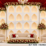 Rajasthani jharokha wedding backdrop, luxury wedding stage décor, royal reception stage setup, jharokha frame wedding decoration, premium wedding backdrop panels, Indian palace style wedding stage, wooden wedding stage manufacturer, floral wedding backdrop, engagement stage decoration, nikah stage décor, wedding sofa stage setup, luxury indoor wedding décor, designer wedding stage panels, royal event stage backdrop, traditional Indian wedding stage, illuminated wedding backdrop, premium wedding event decor, destination wedding stage setup, handcrafted jharokha backdrops.