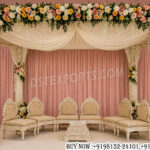 royal wedding mandap, bridal groom mandap chairs, luxury wedding seating, carved wedding mandap, ivory wedding mandap, floral wedding canopy, traditional wedding mandap, premium wedding décor, designer mandap setup, wedding ceremony seating, luxury mandap chairs, Indian wedding stage décor, decorative wedding pillars, elegant wedding canopy, banquet hall mandap, handcrafted wedding furniture, wedding ritual seating, floral mandap decoration, destination wedding mandap, bridal stage décor, cultural wedding setup, luxury wedding stage, carved mandap pillars, reception ceremony mandap, royal wedding furniture