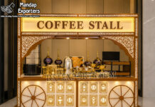 Designer Banquet Coffee & Tea Counter Manufacturer Premium stainless steel live wedding food stall counter with decorative white and gold panels, elegant center arch, and luxury catering setup for wedding receptions, banquets, hotels, and event décor.