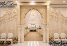 Luxury Carved 3D Fiber Panel for Entry Gate Luxury carved 3D fiber panel entry gate with royal Mughal-style arch, decorative side panels, and elegant white finish for wedding entrance decoration.