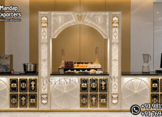 Premium Live Stall Counter for Wedding Decor Premium stainless steel live wedding food stall counter with decorative white and gold panels, elegant center arch, and luxury catering setup for wedding receptions, banquets, hotels, and event décor.