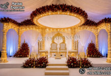 Exclusive Floating Radhika Wedding Mandap Exclusive Floating Radhika Wooden Wedding Mandap with grand circular floral canopy, hand-carved golden pillars, intricate arch frames and luxury Indian wedding ceremony décor.