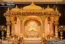Grand Golden Mandap with Domes for Indian Weddings Grand golden Indian wedding mandap with royal domes, carved pillars, floral decorations, luxury stage backdrop and traditional Hindu wedding décor.