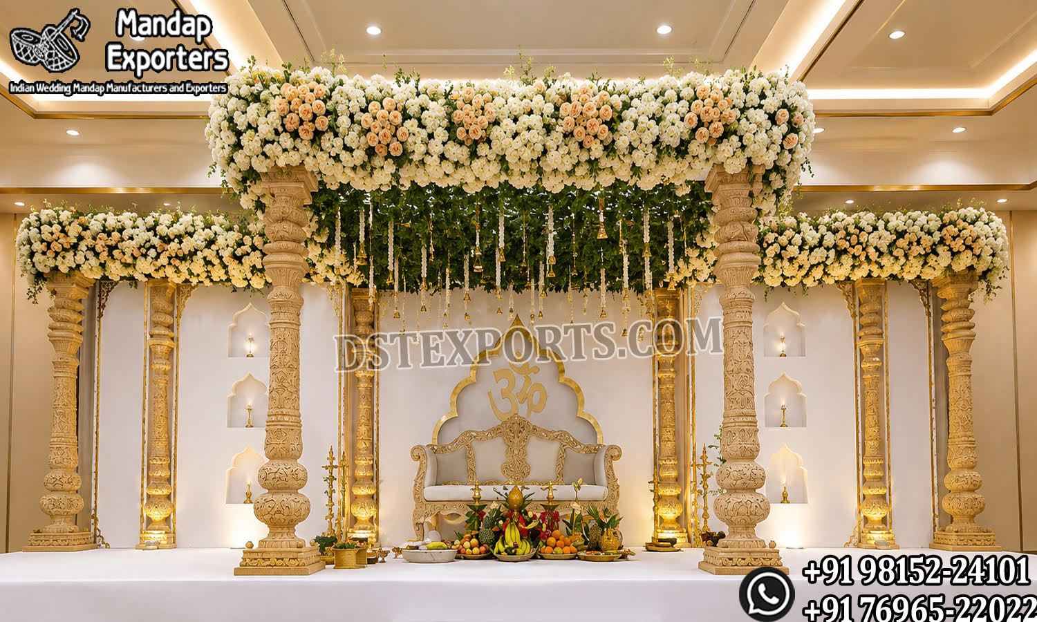 Luxury carved wooden Indian wedding mandap stage with traditional pillars, floral canopy and elegant gold detailing, designed for Hindu weddings, Phera ceremonies and luxury wedding events in the USA.